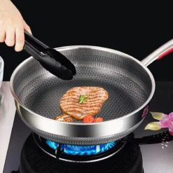 MONFORTT. Hapjespan Ø 28cm Anti-aanbaklaag 7 Lagen Staal Met Deksel 4 MONFORTT. Hapjespan Ø 28cm Anti-aanbaklaag 7 Lagen Staal Met Deksel -Keuken Pot 1200x1200 1607